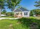 Charming single-story home with a cozy front porch and fresh landscaping at 803 Blackmon St, Rock Hill, SC 29730