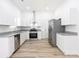 Modern kitchen with stainless steel appliances, granite countertops, and ample cabinet space at 803 Blackmon St, Rock Hill, SC 29730
