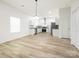 Modern kitchen with stainless appliances, an island, and an adjacent dining area at 803 Blackmon St, Rock Hill, SC 29730