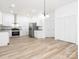 Bright modern kitchen with stainless steel appliances, granite counters, and stylish cabinets at 803 Blackmon St, Rock Hill, SC 29730