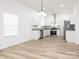 Modern kitchen with stainless steel appliances, granite countertops, and ample cabinet space at 803 Blackmon St, Rock Hill, SC 29730