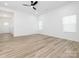 Spacious and bright living room featuring wood-look floors and abundant natural light at 803 Blackmon St, Rock Hill, SC 29730
