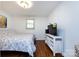 Bright bedroom featuring hardwood floors, a TV, and white walls at 846 Gist Rd, Rock Hill, SC 29732