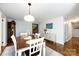 Stylish dining room features hardwood floors, ample lighting, and seamless transition to other living spaces at 846 Gist Rd, Rock Hill, SC 29732