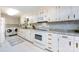 A well-equipped kitchen featuring white appliances, and ample counter space at 846 Gist Rd, Rock Hill, SC 29732