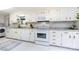 Clean kitchen design featuring a full suite of appliances and white cabinets with granite countertops at 846 Gist Rd, Rock Hill, SC 29732