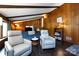 Inviting living room with beamed ceilings, wood paneling, and comfortable seating at 846 Gist Rd, Rock Hill, SC 29732