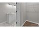 Modern bathroom featuring double sinks with elegant countertops and a walk-in closet at 880 Legion Club Rd, Salisbury, NC 28146