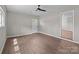 Bright bedroom features hardwood floors, and a glass door with a side window at 880 Legion Club Rd, Salisbury, NC 28146