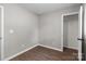 A well-lit room featuring luxury vinyl plank flooring, a closet, and fresh paint at 880 Legion Club Rd, Salisbury, NC 28146
