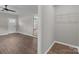 Bedroom with hardwood floors featuring a walk-in closet and bathroom at 880 Legion Club Rd, Salisbury, NC 28146