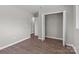 Bedroom with hardwood floors and a closet with an open door at 880 Legion Club Rd, Salisbury, NC 28146