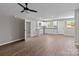 Open floor plan with a view of the modern kitchen featuring white cabinets and granite countertops at 880 Legion Club Rd, Salisbury, NC 28146