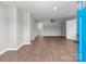 A spacious living room with modern flooring and a view of the backyard at 880 Legion Club Rd, Salisbury, NC 28146