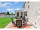Backyard patio with seating and grill, perfect for outdoor entertaining at 9102 Buckley Ct, Charlotte, NC 28269