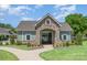 Community center entrance with stone accents and manicured landscaping at 9102 Buckley Ct, Charlotte, NC 28269