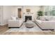Comfortable living room with a classic fireplace, stylish seating, and an inviting atmosphere at 9102 Buckley Ct, Charlotte, NC 28269