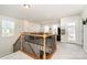 Loft featuring oak railing and lots of natural light at 9102 Buckley Ct, Charlotte, NC 28269
