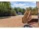 Spacious backyard featuring a new deck with stairs and ample green space for recreation and landscaping at 104 Cleveland Ave, Albemarle, NC 28001