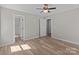 Spacious bedroom with neutral walls and hardwood floors at 104 Cleveland Ave, Albemarle, NC 28001