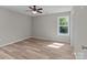 Bedroom with hardwood floors and a ceiling fan at 104 Cleveland Ave, Albemarle, NC 28001