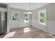 Bright dining room with large windows and natural light at 104 Cleveland Ave, Albemarle, NC 28001