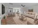 Spacious living room with hardwood floors, stylish decor, and an open concept layout, perfect for modern living at 104 Cleveland Ave, Albemarle, NC 28001