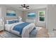 Staged main bedroom with bed, furnishings, and natural light at 104 Cleveland Ave, Albemarle, NC 28001