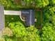 Overhead view of a well-maintained property featuring a spacious yard and mature trees at 11104 Pine Grove Ave, Mint Hill, NC 28227