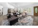 Open living space with vaulted ceiling and hardwood flooring at 11104 Pine Grove Ave, Mint Hill, NC 28227