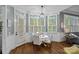 Breakfast nook area with large windows providing natural light and views of the backyard at 116 Anderson Farm Ct, Mooresville, NC 28117