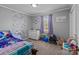 Cozy bedroom with carpeting and decor at 1238 Moss Springs Rd, Albemarle, NC 28001