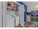 Laundry room with washer, dryer and shelving for storage at 1238 Moss Springs Rd, Albemarle, NC 28001