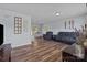 Comfortable living room area with durable flooring and abundant natural light at 1238 Moss Springs Rd, Albemarle, NC 28001