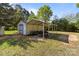 An open shed with bikes and equipment, providing ample outdoor storage space at 1238 Moss Springs Rd, Albemarle, NC 28001