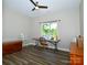 Bedroom with a large window, ceiling fan, and hardwood style floors at 129 Devon Dr, Heath Springs, SC 29058