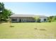 Single-story home featuring a well-manicured front lawn at 129 Devon Dr, Heath Springs, SC 29058