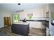Modern kitchen features stainless steel appliances and functional center island at 129 Devon Dr, Heath Springs, SC 29058