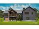 Nice modern farmhouse-style home with a covered porch and landscaped yard at 181 Asbury Cir, Mooresville, NC 28117