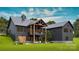 Lovely modern farmhouse-style home with a covered porch and a spacious yard at 181 Asbury Cir, Mooresville, NC 28117