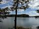 Scenic lake view with fall foliage and blue skies at 181 Asbury Cir, Mooresville, NC 28117