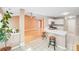 Kitchen view open to living space, offering stainless appliances and barstool seating at 13817 Kings Carriage Ln, Charlotte, NC 28278