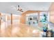 Spacious living area flows into an open kitchen, complete with bar seating and plenty of natural light at 13817 Kings Carriage Ln, Charlotte, NC 28278