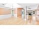 Bright, open-concept space showcasing hardwood floors and abundant natural light at 13817 Kings Carriage Ln, Charlotte, NC 28278