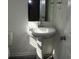 Bathroom with modern fixtures, pedestal sink, and ample lighting at 148 Kodak Dr, Statesville, NC 28625