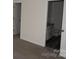 View of a bedroom showing a door to an ensuite bathroom at 148 Kodak Dr, Statesville, NC 28625