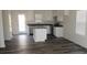 New kitchen features white cabinets, granite countertops and stainless steel appliances at 148 Kodak Dr, Statesville, NC 28625