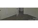 This carpeted bedroom features neutral walls, offering a serene and inviting space at 149 Kodak Dr, Statesville, NC 28625