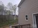 Charming exterior view, showcasing the side and partial backyard at 149 Kodak Dr, Statesville, NC 28625