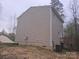 This property boasts a well-maintained yard and wood deck, enhancing outdoor living and curb appeal at 149 Kodak Dr, Statesville, NC 28625